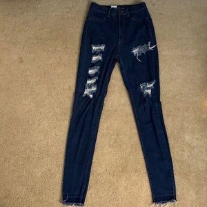 Dark wash ripped high wasted jeans